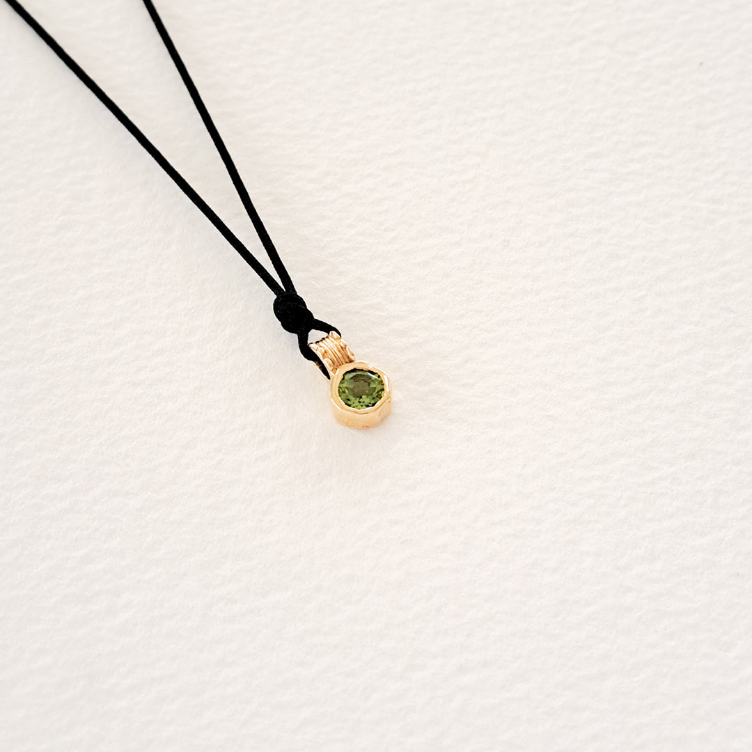 Earth/Green Peridot pendant on thread