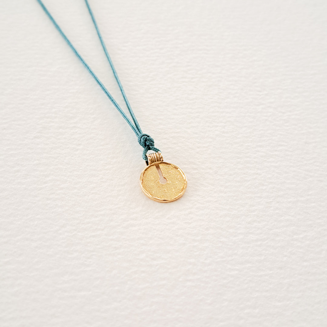 Circle of Elements pendant on thread