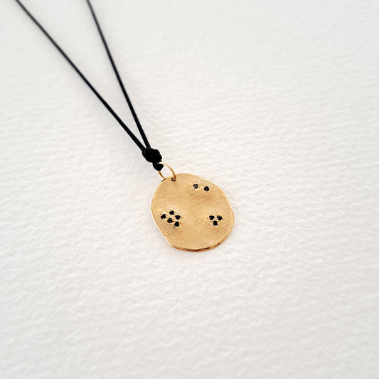 Origins IV pendant on thread