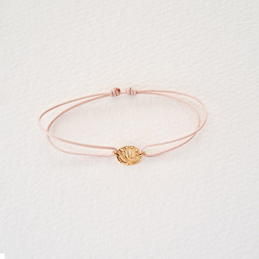 Lotus bracelet on thread