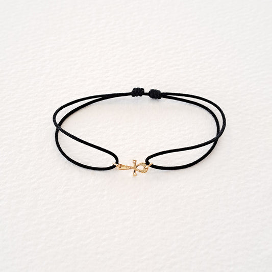 Ankh bracelet on thread