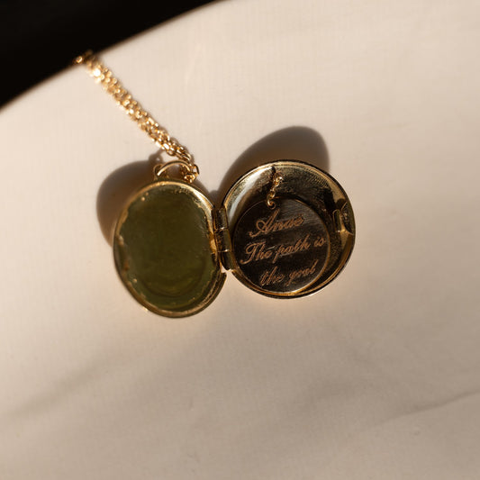 Cosmic Eye locket with a diamond