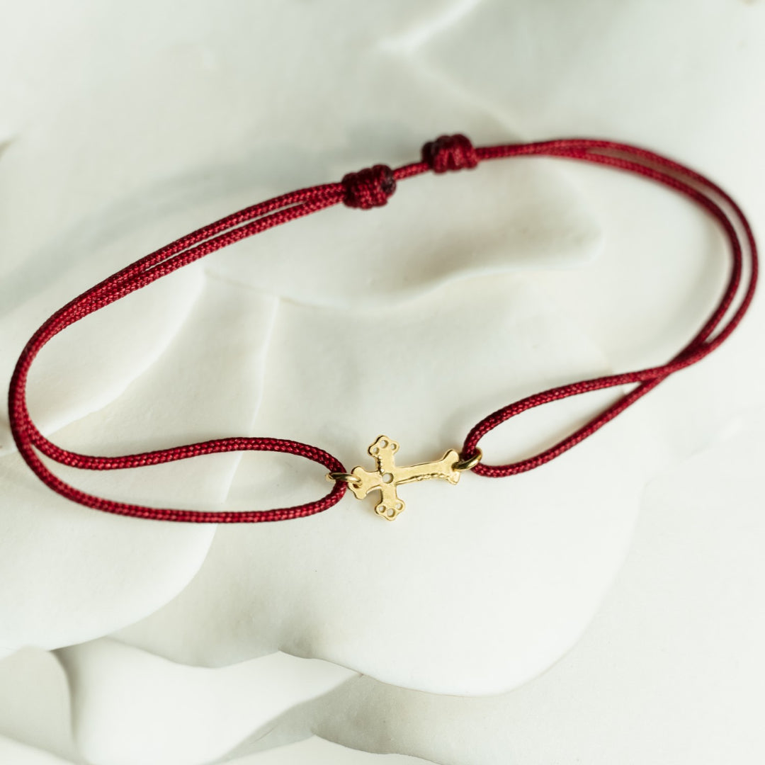 Cross bracelet on thread
