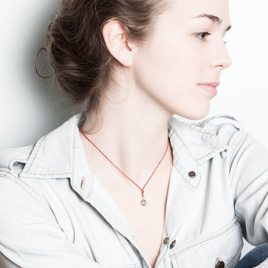 Roots pendant on thread