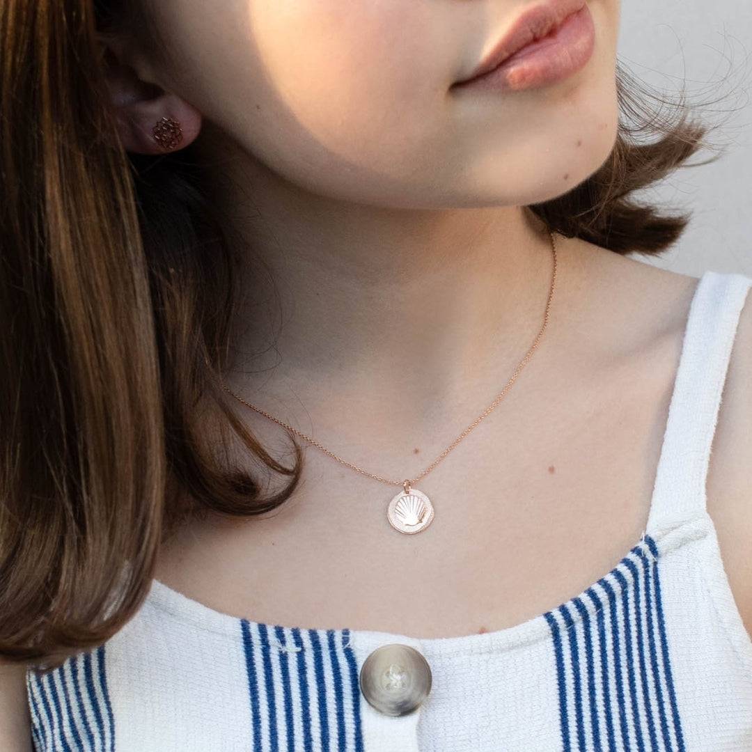 Tiny Seashell medal for Girls