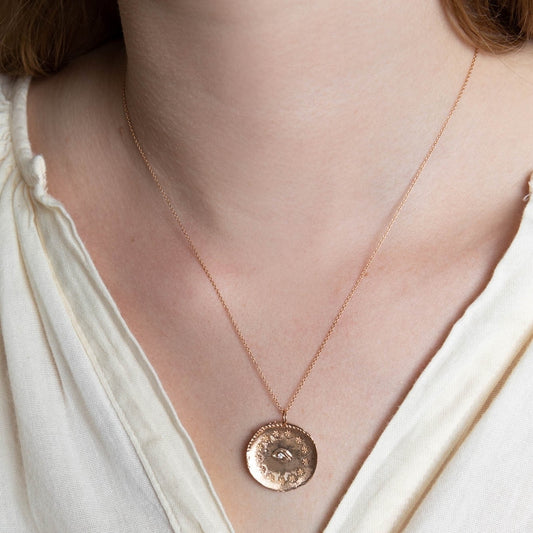 Cosmic Eye medal with diamond