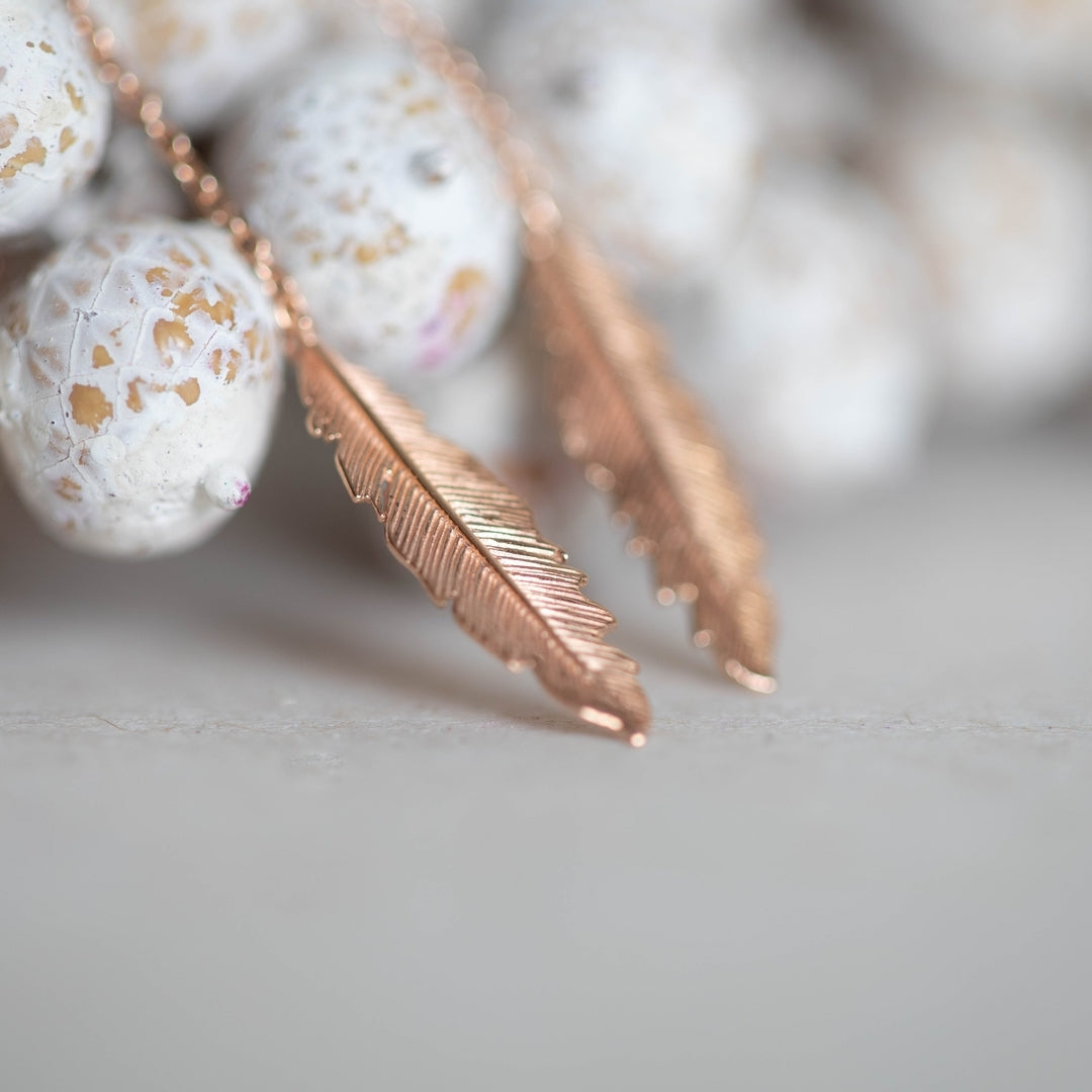Feather long earrings