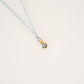 Water/Blue Topaz pendant on thread