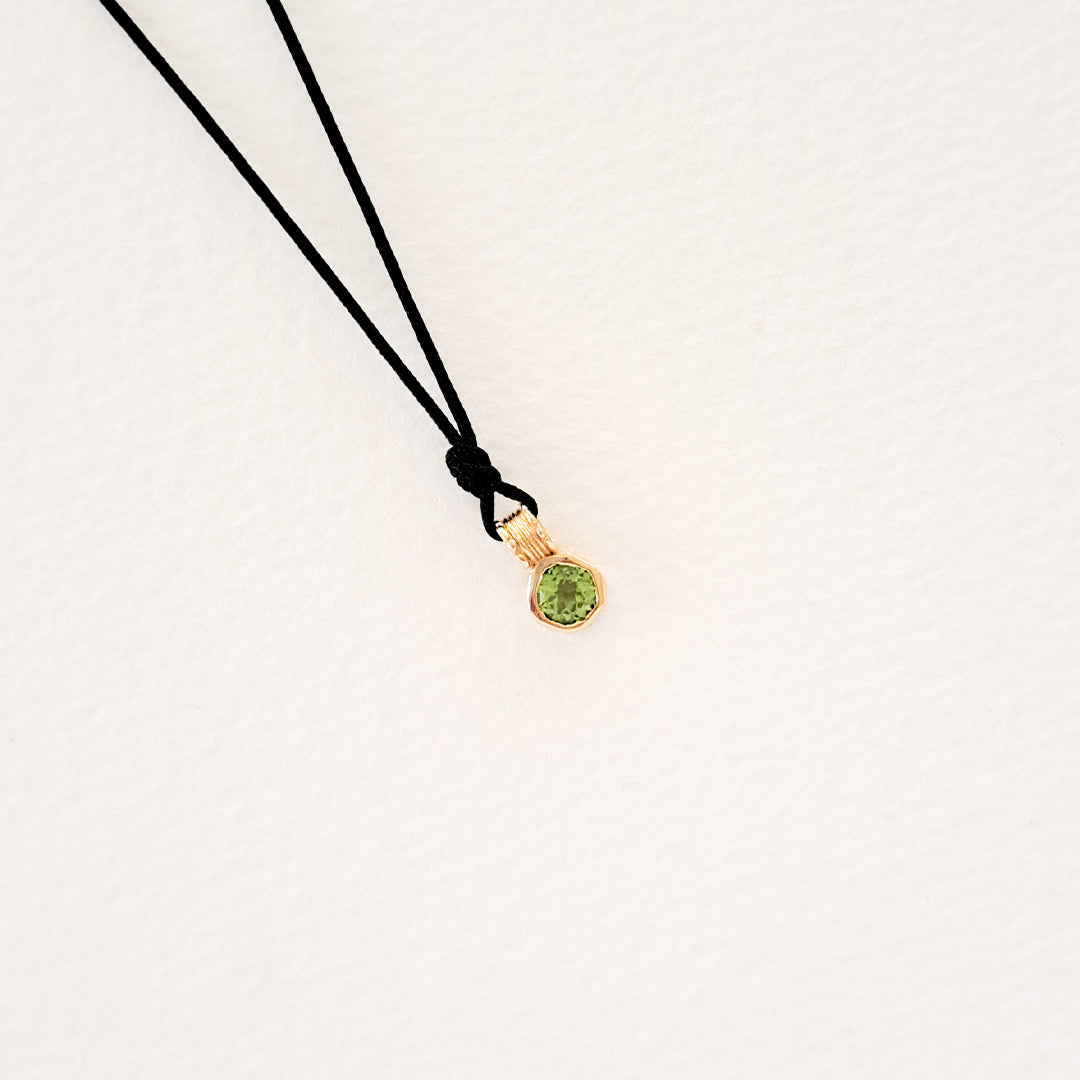 Earth/Green Peridot pendant on thread