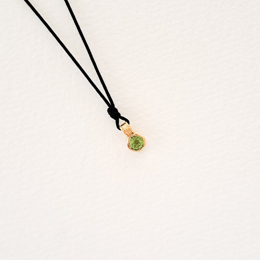 Earth/Green Peridot pendant on thread