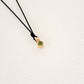 Earth/Green Peridot pendant on thread