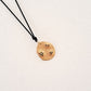 Origins IV pendant on thread
