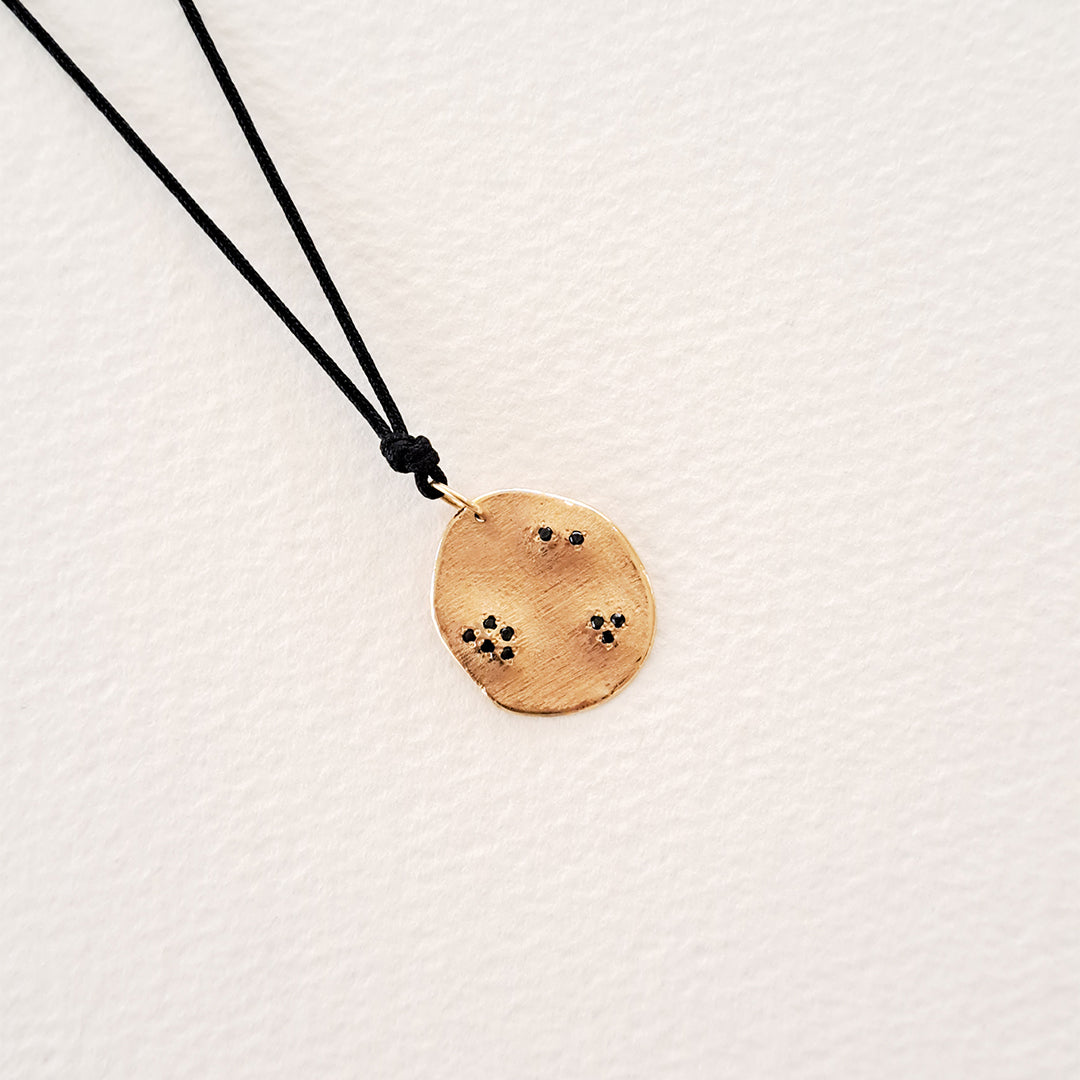 Origins IV pendant on thread