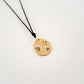 Origins IV pendant on thread