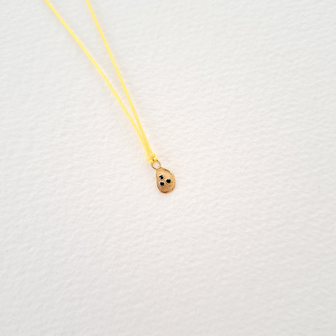 Origins VI pendant on thread