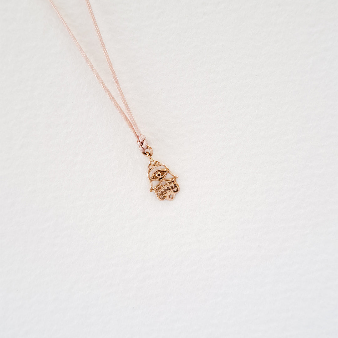 Fatima's Hand pendant on thread