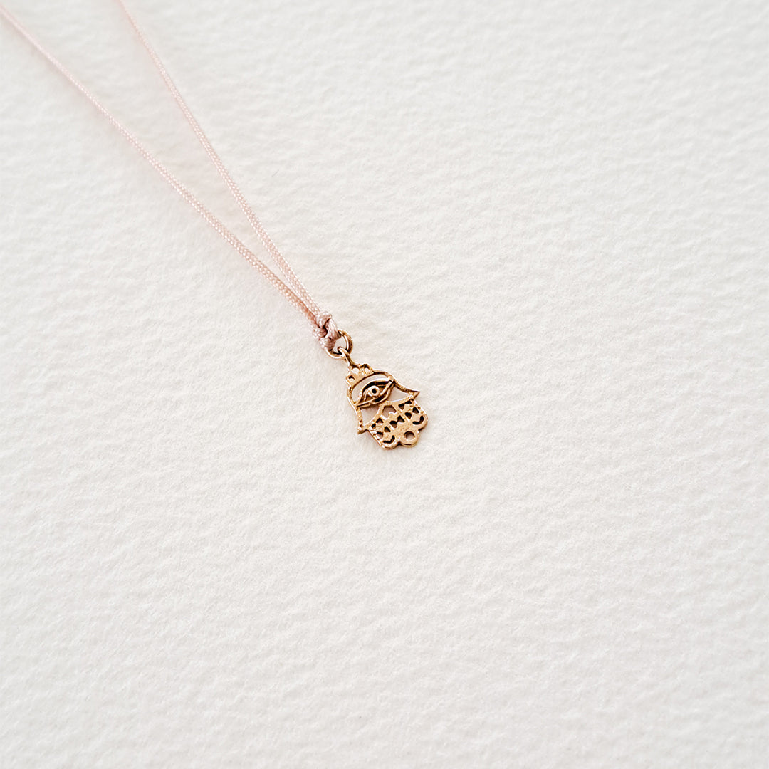 Fatima's Hand pendant on thread