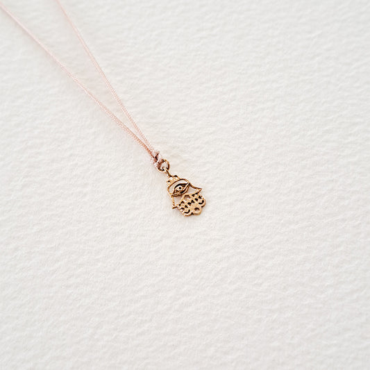 Fatima's Hand pendant on thread