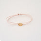 Lotus bracelet on thread