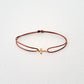 Cross bracelet on thread