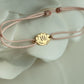 Lotus bracelet on thread