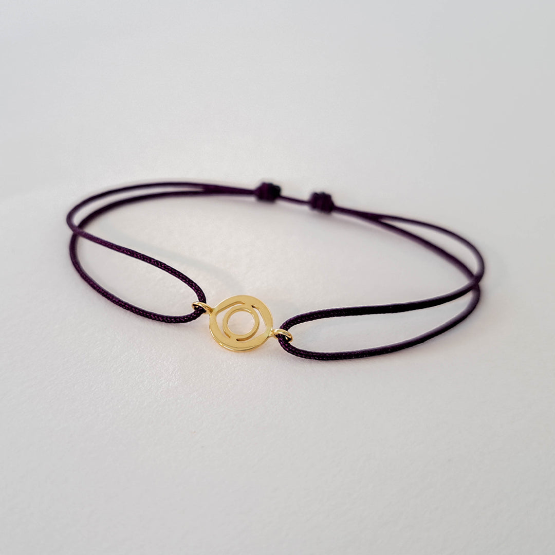 Serenity disc bracelet on thread