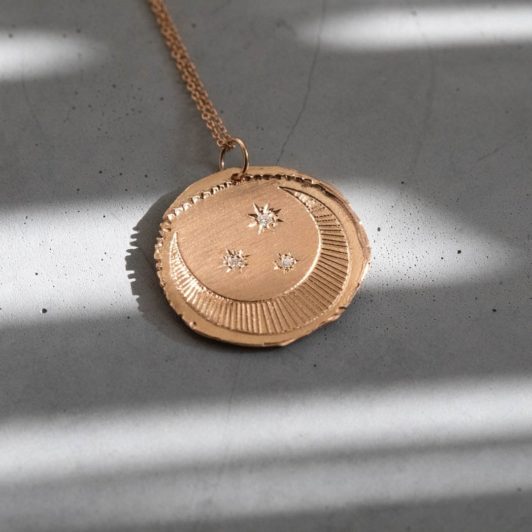 Starry Moon medal with diamonds